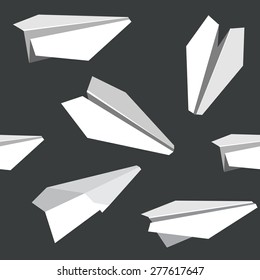 pattern seamless texture of a paper airplane toy origami. white on black