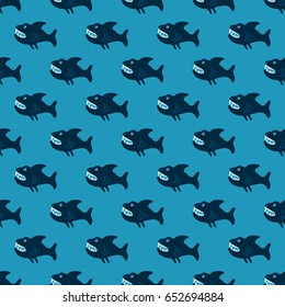 pattern with sharks, seamless pattern for textile, on a blue background