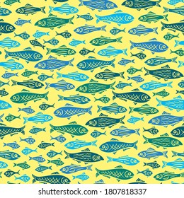 siluetas patrón de peces de colores: 
siluetas azul, azul claro y verde sobre fondo amarillo