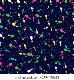 pattern silhouettes of colorful fish on black  background