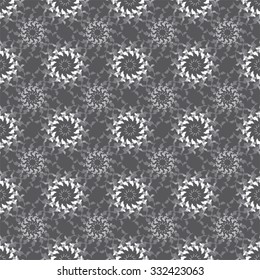 Pattern of silver and white spiky floral circles on a dark silver background