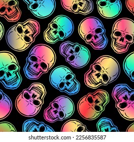 Pattern with skulls. Multi-colored skulls on a black background. Seamless pattern.