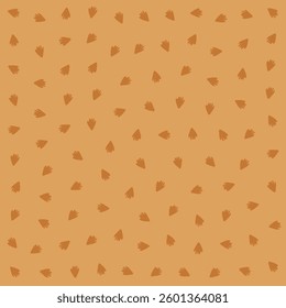 a pattern of small brown flowers on a tan background