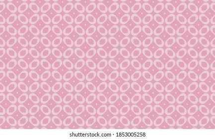 pattern of small oval elements with dots in pink tones.