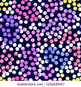Pattern with small size spots and brush strokes. Multicolored polka-dot pattern. Pattern with multicolored dots on a blue background.