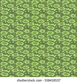 Pattern snake skin on a green background. 