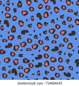 Pattern with spots of leopard pink on a blue background