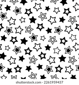 Patrón con estrellas. Estrellas negras de fondo blanco.