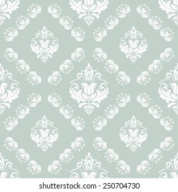 Pattern in the style of baroque. Seamless vector background. Damask texture with orient and floral elements.Blue and white colors