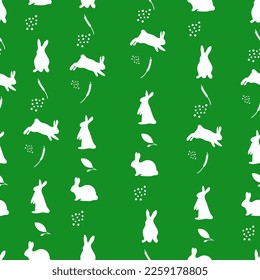 Pattern of stylized bunnies with plants. Simple pattern. Green background. Seamless pattern.