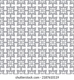 Ein Muster mit stylisierten Kreuzen und Blumen. Er eignet sich gut für Gewebe und Textilien, als Hintergrund für einen Flyer, Banner, Visitenkarten, Tapeten, Verpackungen oder jede gewünschte Idee. Nahtloses Muster.