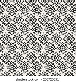 Pattern tile with mandala art. Oriental vector background. Ethnic Retro seamless wallpaper pattern. Vintage black, white and white backgrounds with geometric and simple floral elements.