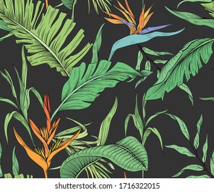 pattern with tropical flowers and palm leaves on a dark background