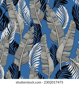 pattern of tropical leaves of palm and banana