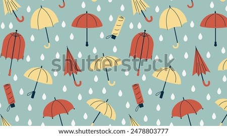 Pattern of umbrellas in different designs. Red and yellow unbrellas on blue background. Rain protection. Fall design for textile, wallpaper, and print.
