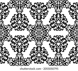 Pattern from vintage lace mandala patterns. Seamless vector background with arabesque ornaments. Black and white. For fabric, tile, wallpaper or packaging.