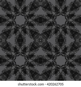 Pattern for wallpaper and textile. Seamless pattern. Black abstract floral ornament on a gray background.