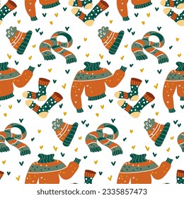 Pattern of warm cozy autumn clothes and details. Cartoon flat vector illustration. Colorful elements for your design. Warm shades. Autumn elements. Sweater, socks, scarf, hat with heart decor
