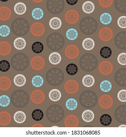 Pattern white, black and blue circles on the dark brown background