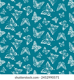 Pattern with white butterflies.Vector seamless pattern with white butterflies on a blue background.