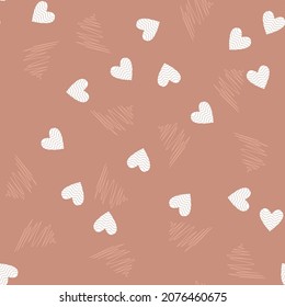 Pattern with white hearts. Seamless  childish drawing from hearts for kids prints, textiles, bed linen on brown. Modern, trendy Valentine's Day pattern. Romantic for the holiday, clothes. Vector 
