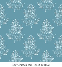 pattern with white ink stamp thuja branches on dusty blue background for winter textile design, scandinavian wallpaper and holiday wrapping paper.