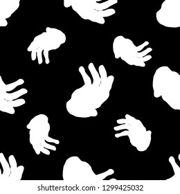 Pattern of white palms on a black background. Seamless.