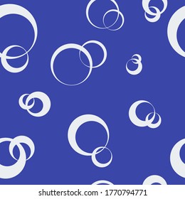 
pattern of white rings on a blue background