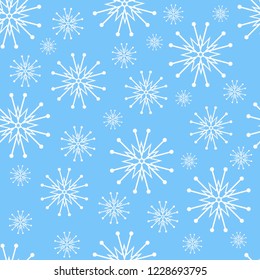 pattern of white snowflakes on blue background