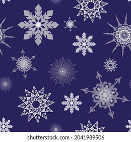 Pattern with white snowflakes on blue background