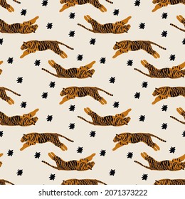 Pattern with wild tigers. Background with the symbol of 2022. Happy New Year. Illustration for textiles with animals. Vector illustration