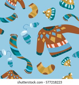 Pattern with winter clothing: hat, sweater, scarf and gloves.