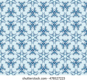 pattern of winter snowflakes. New year series. Blue color. Seamless vector illustration. For the design, printing and presentations.