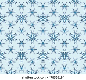 pattern of winter snowflakes. New year series. Blue color. Seamless vector illustration. For the design, printing and presentations.