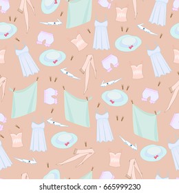 Pattern with women's clothes, a hat on a beige background