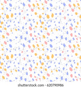 a pattern of yellow, blue and pink spots