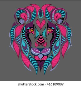 Patterned colored head of the lion. African / indian / totem / boho / tattoo design. It may be used for design of a t-shirt, bag, postcard and poster.