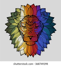 Patterned colorful head of a lion. Abstract ethnic image of the head of a lion with an unusual ornament. Colorful rainbow decoration painted by hand. Series of animals in the ethnic style