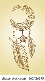 Patterned crescent and star hung with feathers and beads in boho style