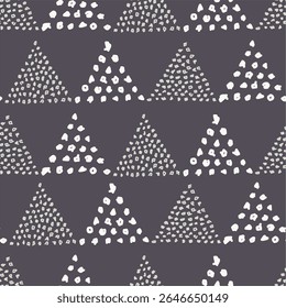 A patterned design featuring triangles and dots in a muted color palette.
