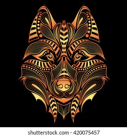 Patterned Golden head of wolf. African, indian design. It may be used for shirt, bag, postcard and poster.