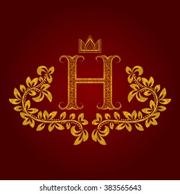 Patterned golden letter H monogram in vintage style. Heraldic coat of arms. Baroque logo template.
