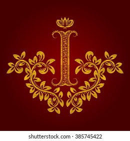 Patterned golden letter I monogram in vintage style. Heraldic coat of arms. Baroque logo template.