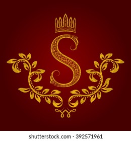 Patterned golden letter S monogram in vintage style. Heraldic coat of arms. Baroque logo template.