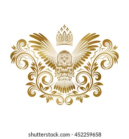Patterned golden owl with outstretched wings. Ethnic coat of arms in tribal totem style.