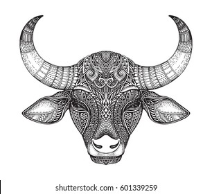 Patterned head of the bull. Hand drawn vector illustration in ornate doodle style. Tribal, ethnic animal design.