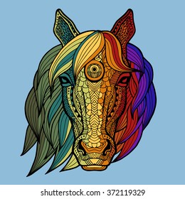 Patterned horse's head in the zentangle style of a blue background with rainbow gradient passing from green to purple. Tribal ornament painted by hand. Series ethnic animals. African, Indian. Logos.