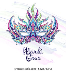 Patterned mask on the grunge background. Mardi Gras festival. Tattoo design. It may be used for design of a t-shirt, bag, postcard, a poster and so on  