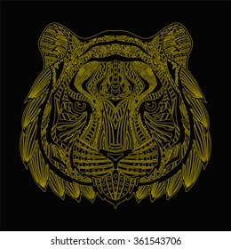 Patterned tiger head with yellow stroke on black background. Abstract ethnic picture tiger head with tribal ethnic ornament. Ornament is painted by hand. Vector. 
