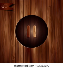Pause icon.Media player button. Wooden texture.